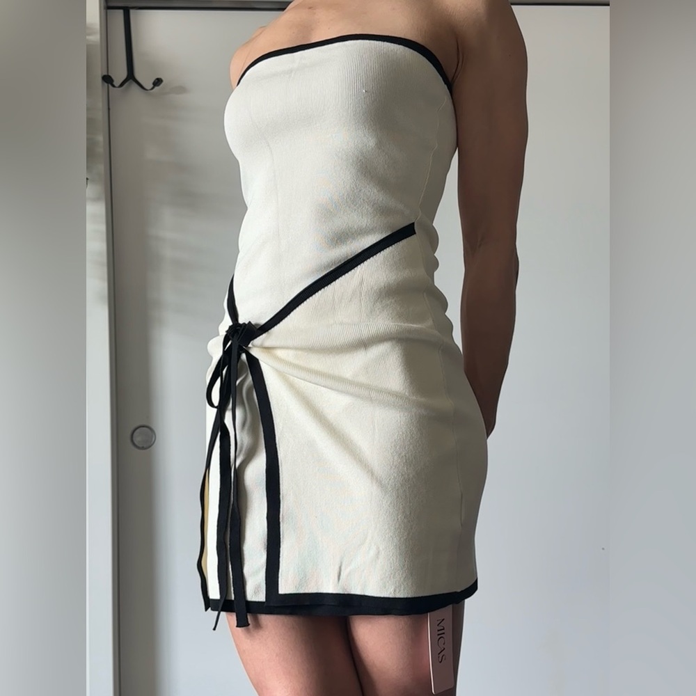 Elegant Cream Dress with Black Accents